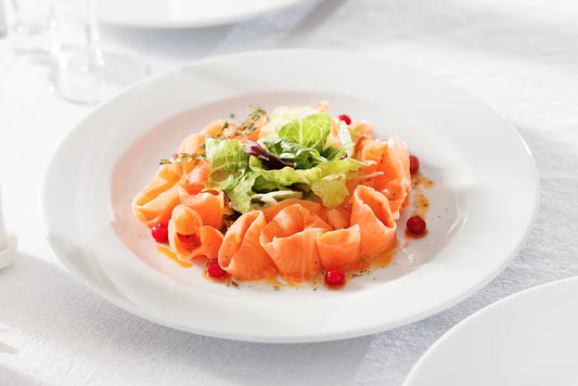 Carpaccio de truite marinée à l’orange et fromage blanc