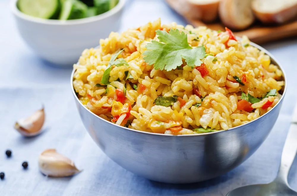 Salade de riz à l'espagnol au curry et à la coriandre